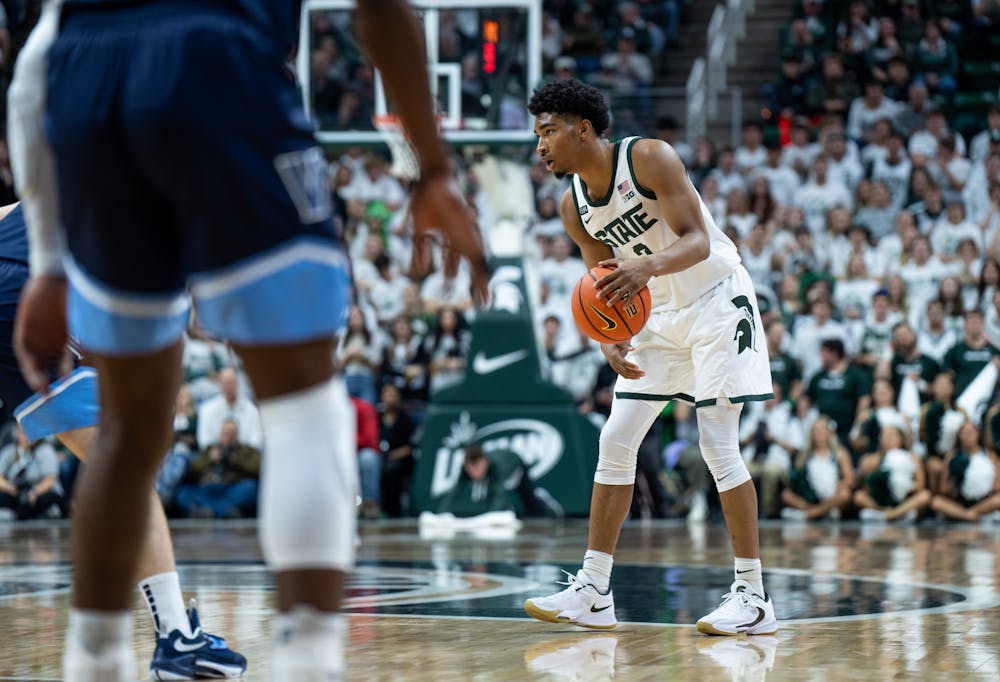 Sophomore guard Jaden Akins (3) dribbles the ball during a game against Villanova at the Breslin Center on Nov. 18, 2022. The Spartans defeated the Wildcats 73-71. 
