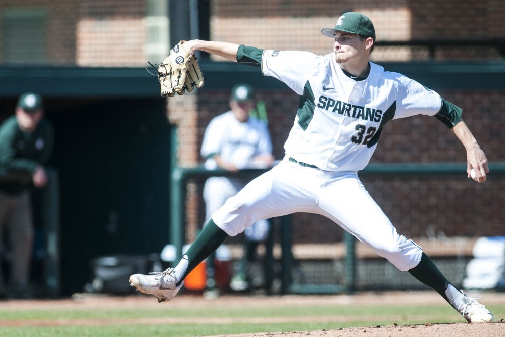 Red-shirt sophomore left-hand pitcher Alex Troop (32) pitches during the game against the University of Minnesota on April 1, 2017 at McLane Stadium at Kobs Field. The Spartans defeated the Goldy Gophers, x-x. 