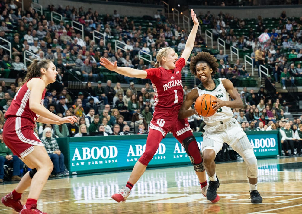 <p>Indiana guard Lexus Bargesser (1) defends against Michigan State guard Kamaria McDaniel (5). The Spartans defeated the Hoosiers 83-78 on Dec. 29, 2022.</p>