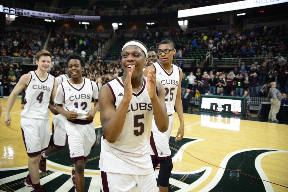 Point guard Cassius Winston celebrates after the game against North Farmington during the MHSAA boy's championship game on March 26, 2016 at Breslin Center.