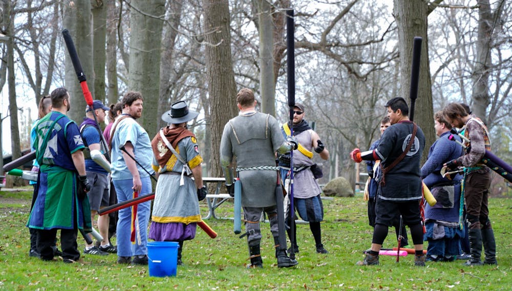 Players gather around to start picking teams at Ashen Hills LARP in Patriache Park, on May 1, 2022.