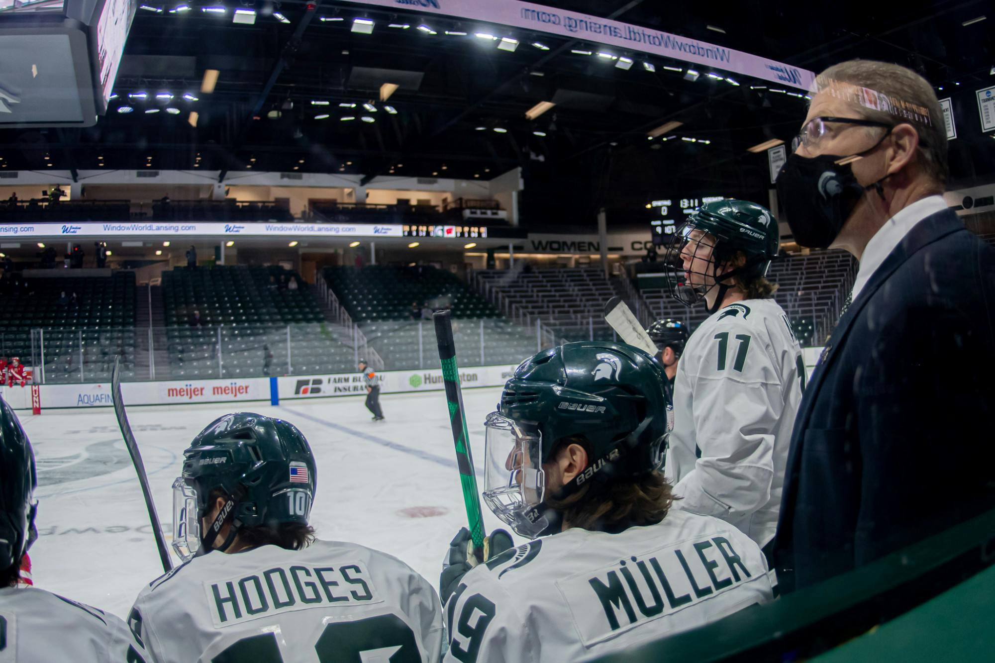 <p>MSU Head Coach Danton Cole and the Spartan bench watch the ice during the team&#x27;s matchup with the Wisconsin Badgers on March 6, 2021. After starting out with a 1-0 lead, the Spartans fell 2-1.</p>