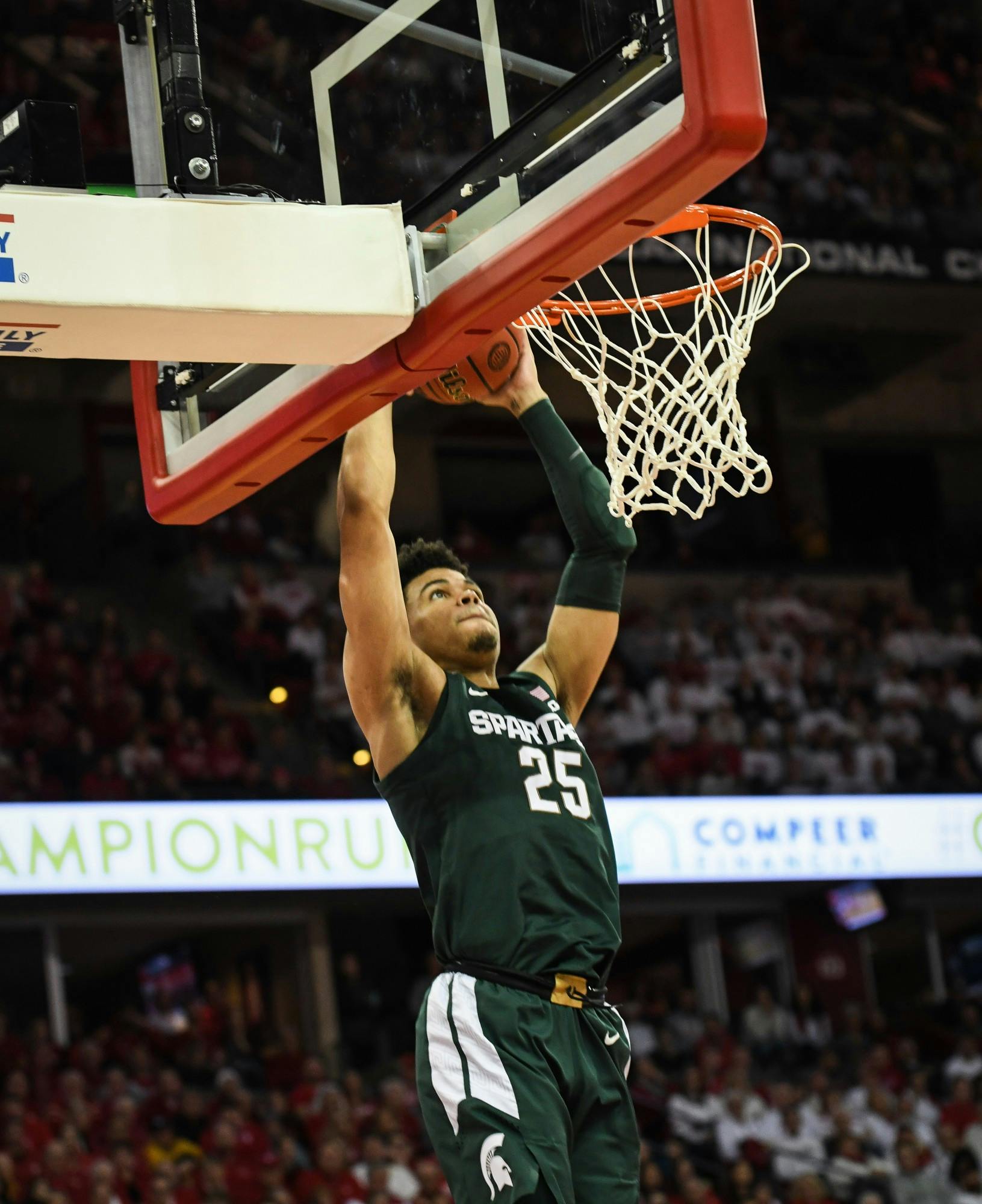 <p>Then-freshman forward Malik Hall (25) goes up for a dunk during the men&#x27;s basketball game against Wisconsin at the Kohl Center in Madison, Wisconsin on Feb. 1, 2020. The Spartans fell to the Badgers 63-64.</p>