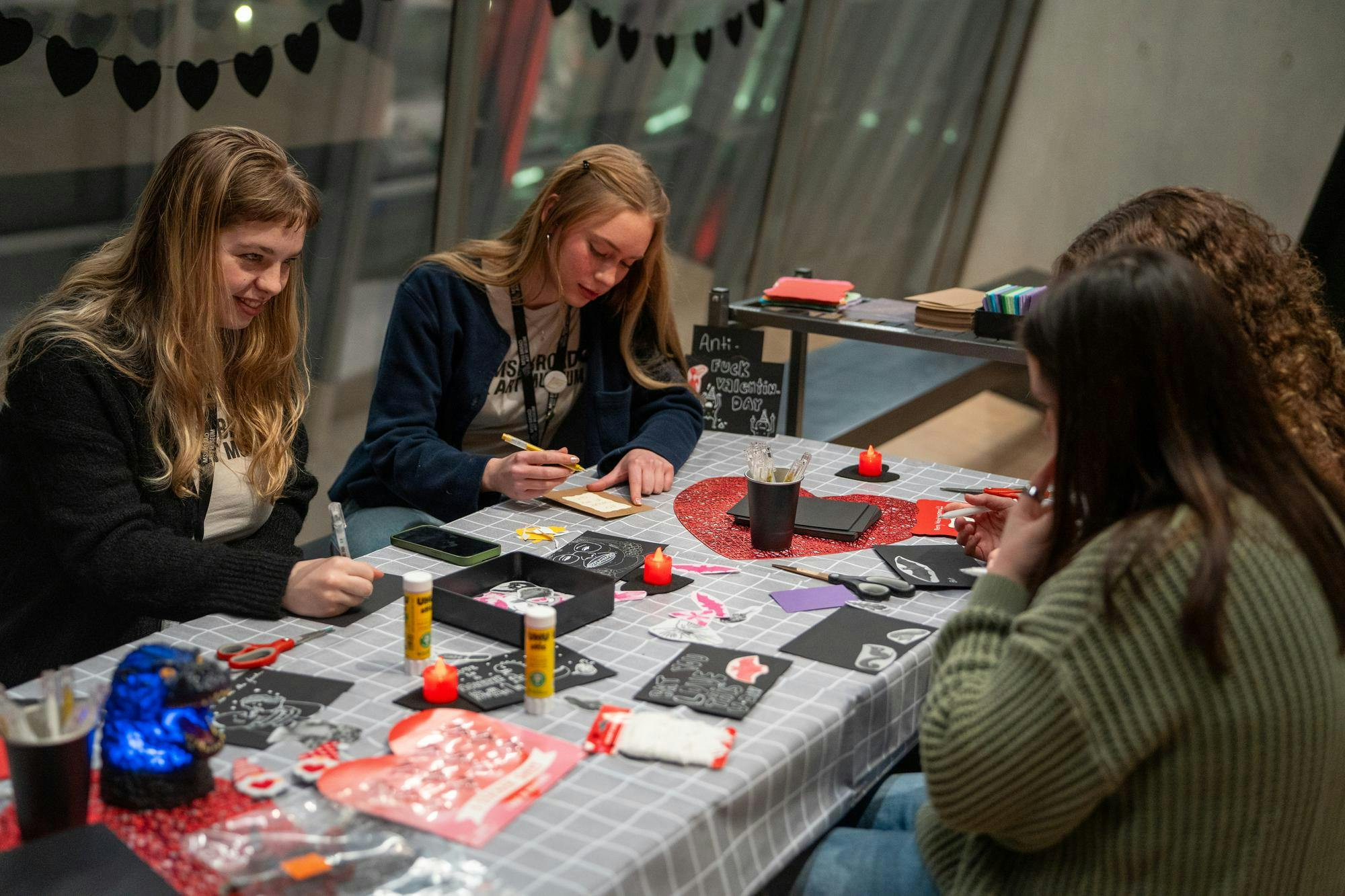 <p>Students make custom shirts during the “Love is a Monster: An Anti-Valentine’s Day Party” at Michigan State University on Wednesday, Feb. 12, 2026, in East Lansing, Mich.</p>