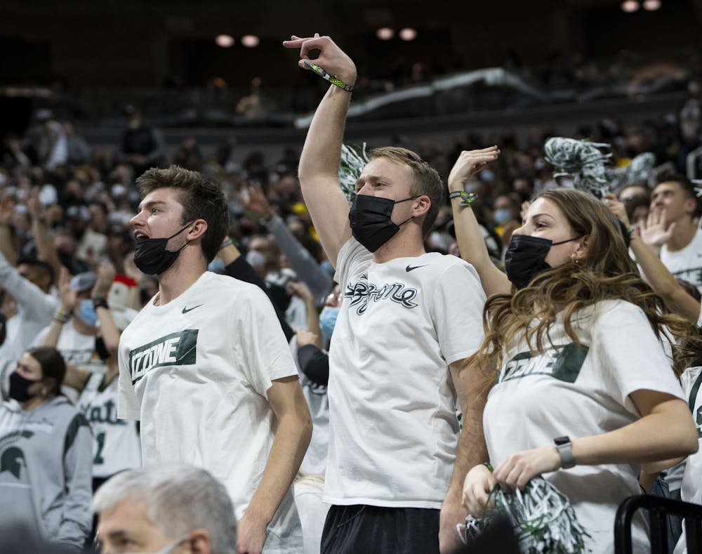 <p>MSU fans cheer for a Spartan three-pointer during MSU’s game against the University of Michigan on Saturday, Jan. 29, 2022. The Spartans ultimately beat the Wolverines 83-67.</p>