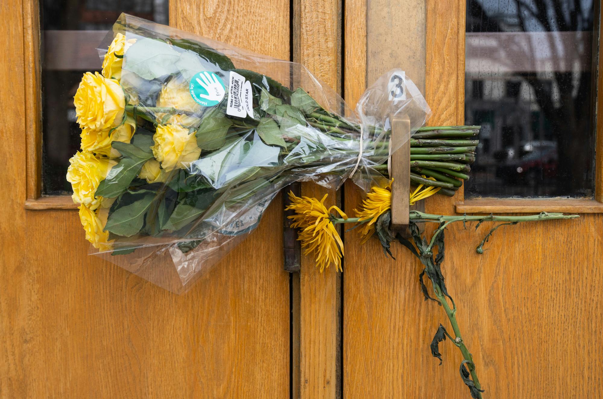 Flowers hang on the door of the Union on Feb. 20, 2023. The day before, 'Spartan Sunday' was held on campus where students and the community came together to take back the campus after a mass shooting took place on Feb. 13, 2023.