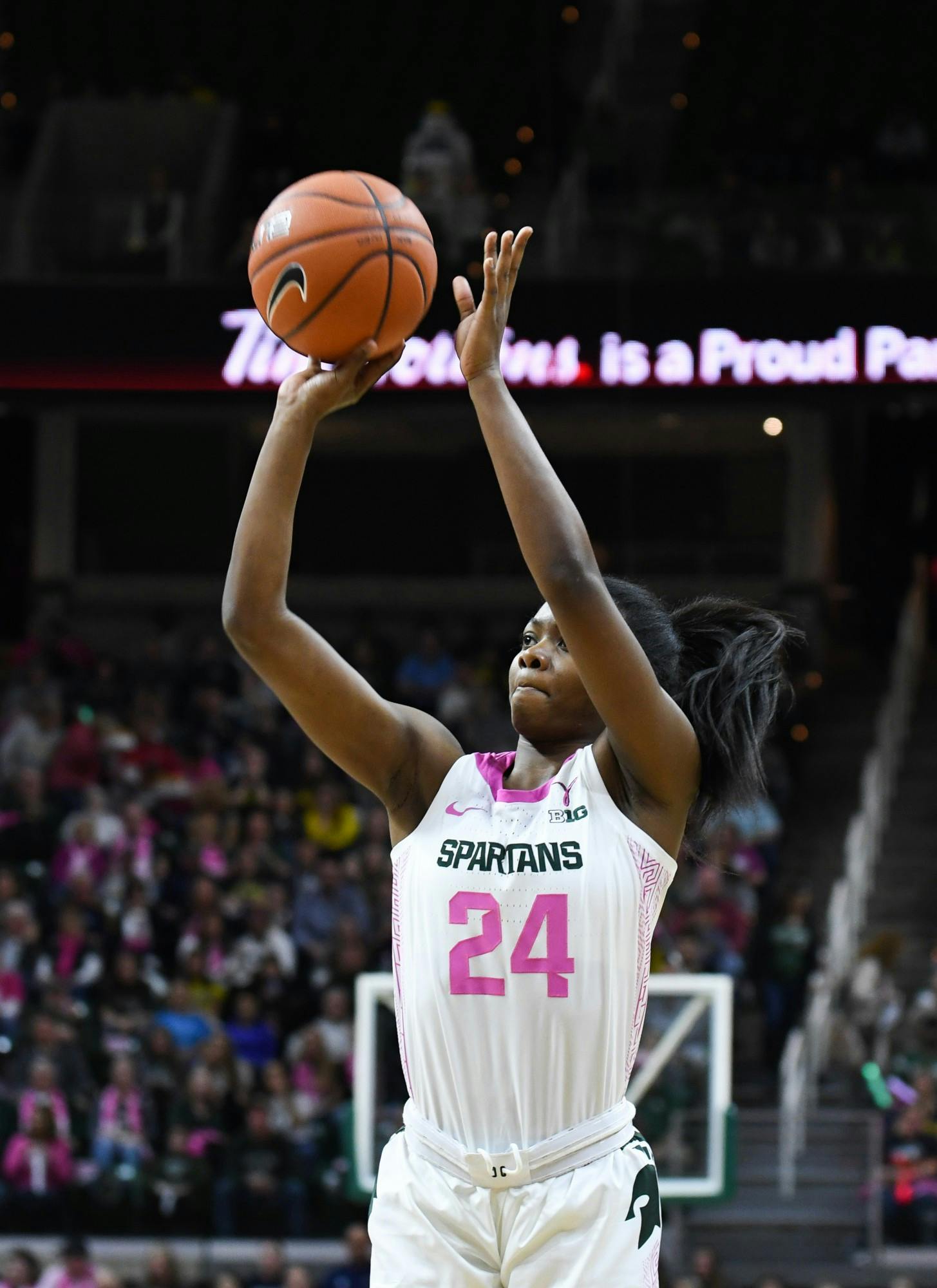 Sophomore guard Nia Clouden (24) takes a shot during the women's basketball game against Michigan at the Breslin Center on February 23, 2020. The Spartans fell to the Wolverines 65-57. 