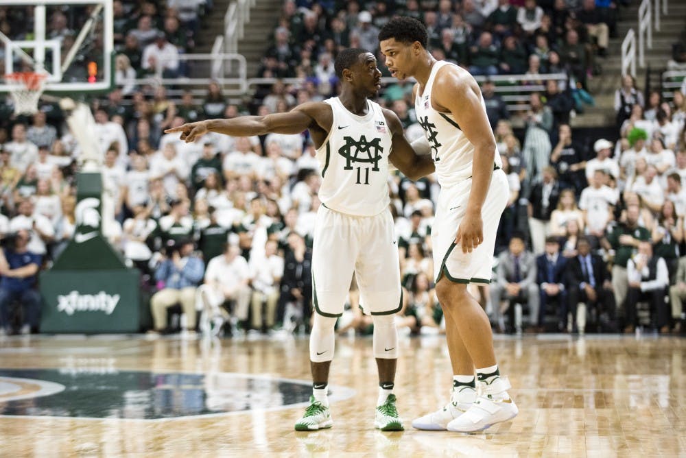 Junior guard Lourawls 'Tum Tum' Nairn Jr. (11) and freshman guard/forward Miles Bridges (22) during the first half of men's basketball game against Iowa on Feb. 11, 2017 at Breslin Center. The Spartans defeated the Hawkeyes, 77-66.