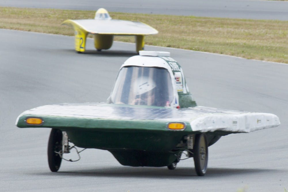 A member of the MSU solar car team drives on a track on July 12, 2012 at Monticello Motor Club in Monticello, N.Y. during the 2012 Formula Sun Grand Prix. Courtesy Photo by Diane Thach