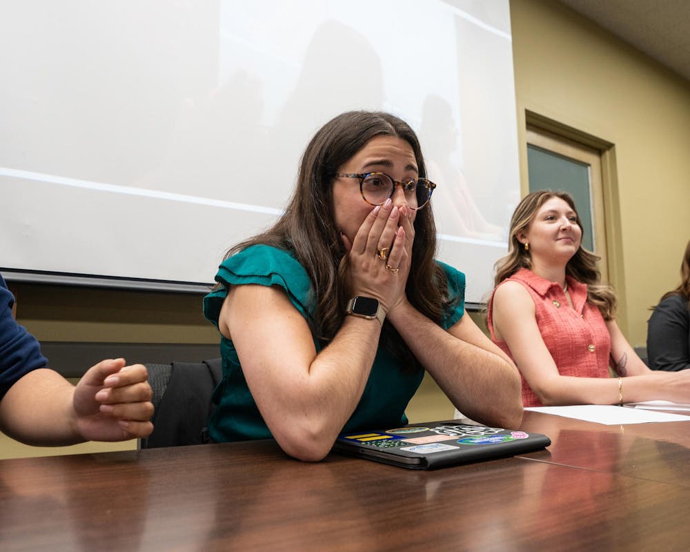 ASMSU Vice President for Internal Administration and future ASMSU President, Maddie Hanes, reacts to hearing her name as the winner of the race for president in the Student Affairs & Services building in East Lansing, MI on April 14, 2026.