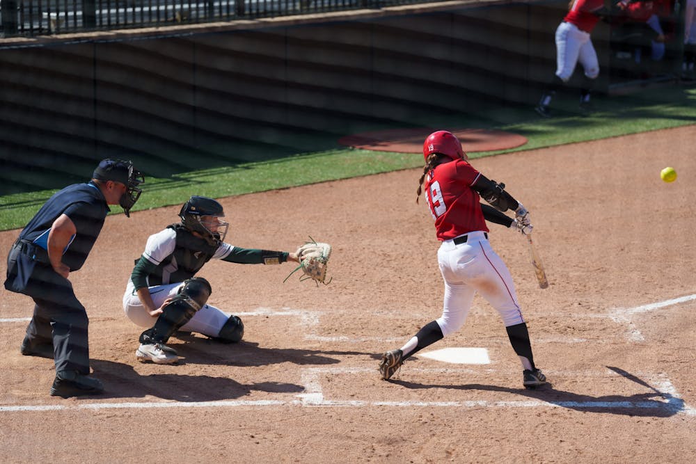 <p>Nebraska sophmore Caitlynn Neal hitting a double to the left of the center in the second inning. Spartans lost 5-4 against Nebraska, on April 10, 2022.</p>