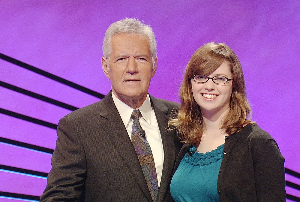 	<p><span class="caps">MSU</span> doctoral student Sara Garnett poses with &#8220;Jeopardy!&#8221; host Alex Trebek. <em>Photo courtesy of Sara Garnett</em></p>