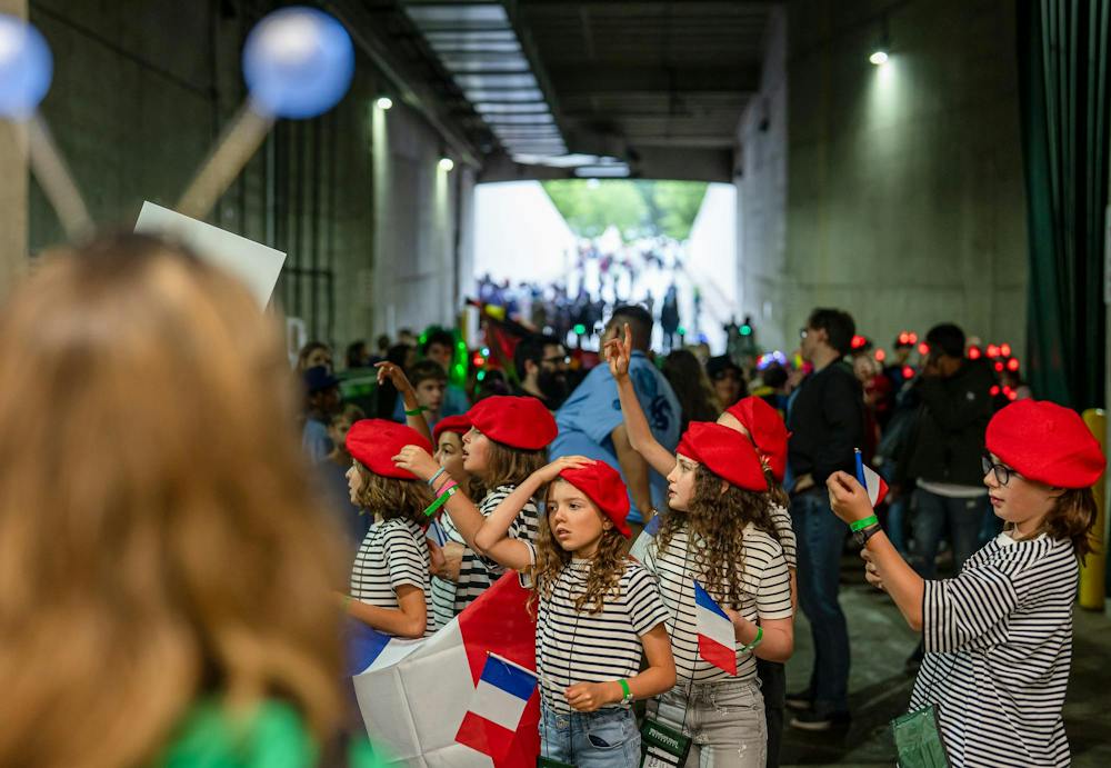 Members of the French Odyssey of the Minds competition at Michigan State prepare to enter the Jack Breslin Center for opening ceremonies in East Lansing, Michigan on May 21, 2025. 