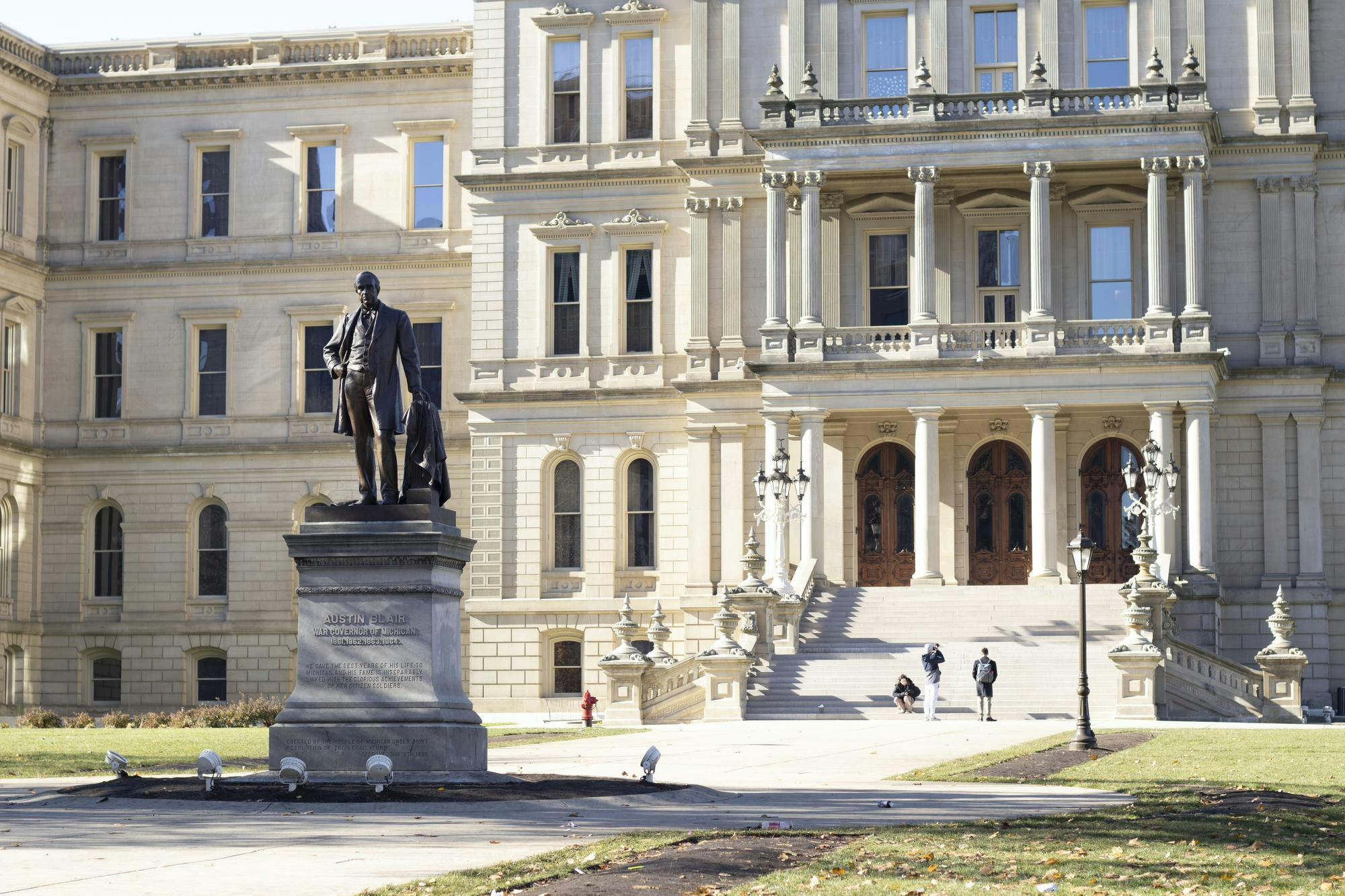 The Austin Blair statue guards the entrance at the Michigan state capitol building, Nov. 18, 2023. 