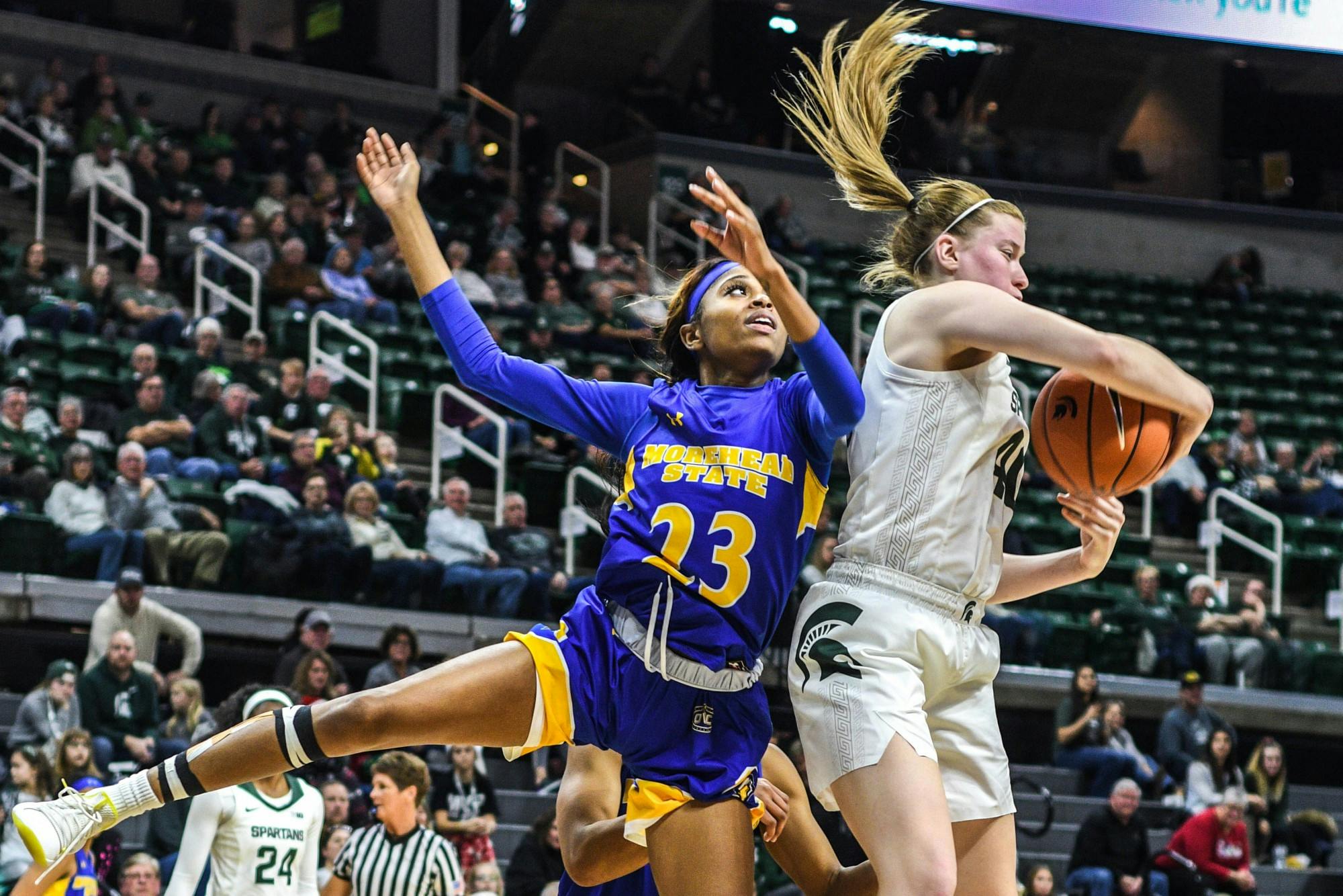 <p>Freshman guard Julia Ayrault (40) grabs the ball during the game against Morehead State at Breslin Center on Dec. 15, 2019. The Spartans defeated the Eagles, 93-48.</p>