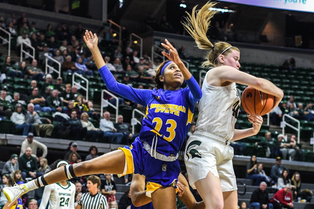 <p>Freshman guard Julia Ayrault (40) grabs the ball during the game against Morehead State at Breslin Center on Dec. 15, 2019. The Spartans defeated the Eagles, 93-48.</p>
