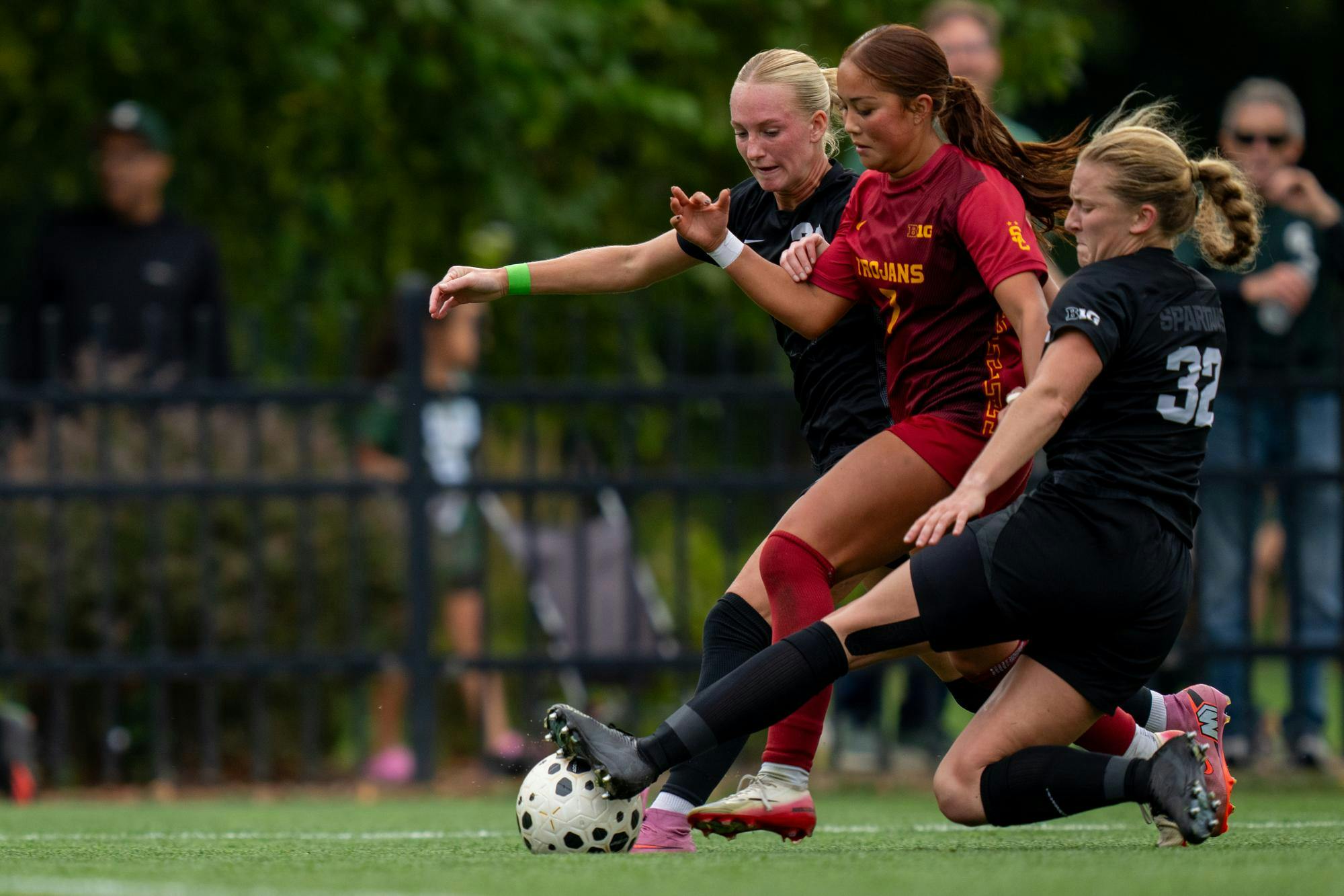 <p>MSU defender, Maleeya Martin (21), USC midfielder, Jaiden Rodriguez (7), and MSU defender, Maggie Illig (32) fight for control of the ball during the MSU versus USC Women's Soccer game at Michigan State Universities DeMartin Soccer Stadium on Sunday, Sept. 21, 2025.</p>