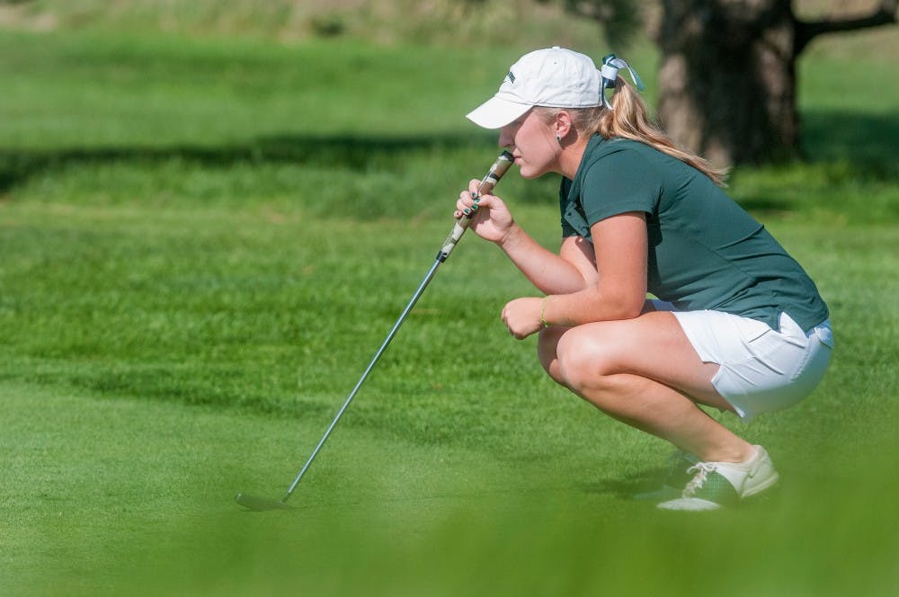 Senior Caroline Powers plays in her last home tournament at the Mary Fossum Invitational on Sunday afternoon at Forest Akers West Golf Course. Powers was the runner-up with a 1-over 217. Natalie Kolb/The State News