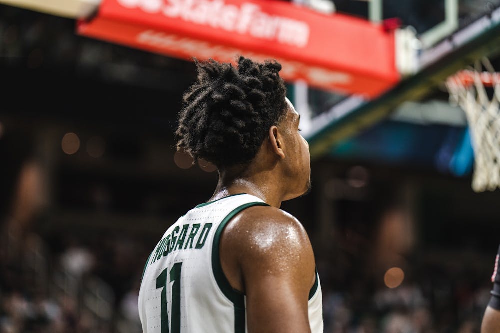 <p>Junior guard A.J. Hoggard (11) looks for an open teammate to pass to (63-58) on Feb. 7, 2023. The Spartans defeated the Terps with a score of 63-58.</p>