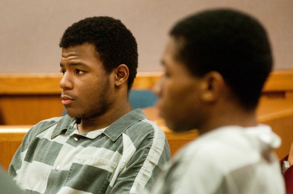 Eastpointe, Mich., resident Marquez Dominique Cannon, 17, left, appears for preliminary examination on Tuesday, Aug. 21, 2012, in East LansingÕs 54B District Court, 101 Linden St. Cannon is facing charges related to the death of MSU freshman Olivia Pryor.