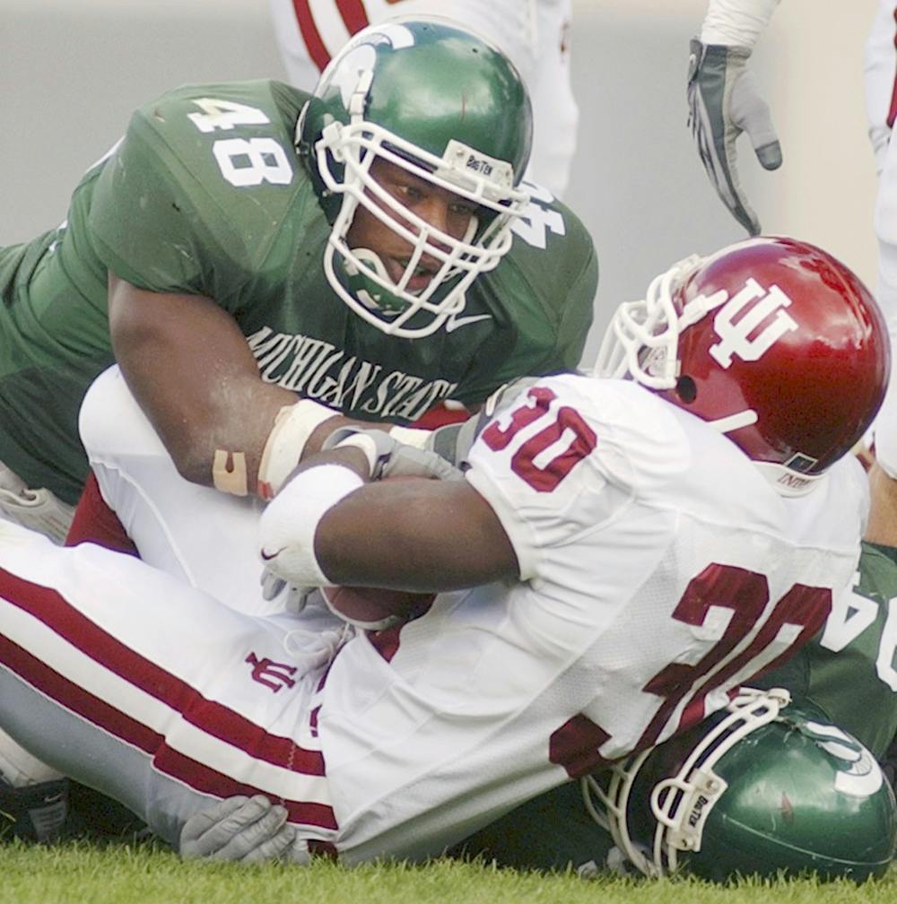 Then-Sophomore linebacker Seth Mitchell stares down Indiana running back Chris Taylor Saturday(10/4/03) at Spartan Stadium. State News File Photo