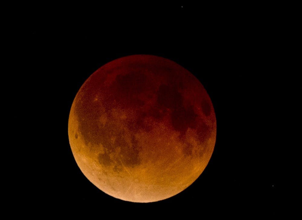 <p>A total lunar eclipse or "blood moon" is photographed in the early morning hours on April 15, 2014 in Kansas City, Mo. This was the first of a lunar eclipse tetrad, which is a series of four total eclipses. The next three lunar eclipses will occur on Oct. 8; April 4, 2015; and Sept. 28, 2015.</p>
