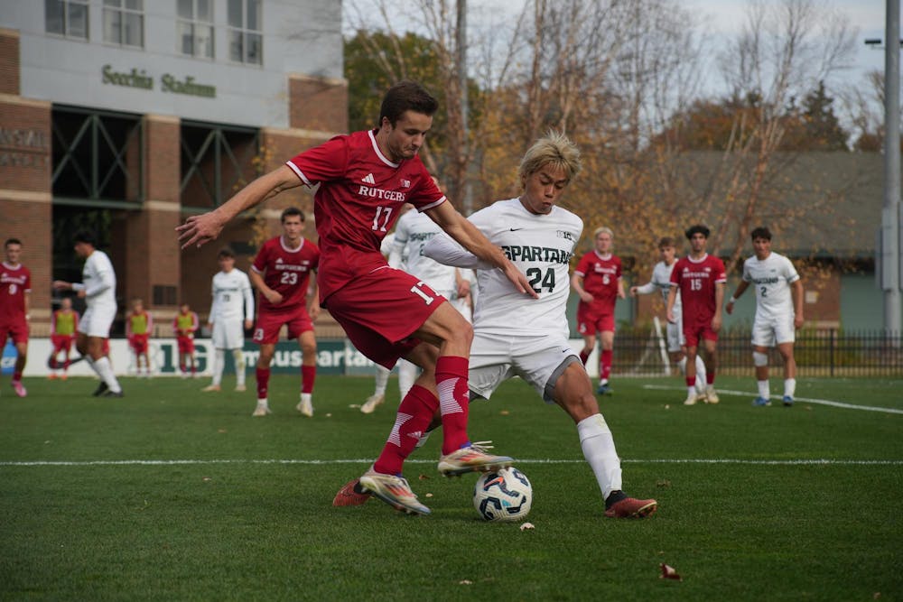 <p>Michigan State University Senior Shion Soga tries to take back the ball from Ola Maeland at DeMartin Stadium on Nov. 3, 2024.</p>