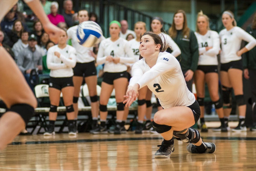 Redshirt junior outside hitter Autumn Bailey (2) bumps the ball during the first round of the NCAA Championship against Fairfield University on Dec. 2, 2016 at Jenison Field House. The Spartans defeated the Stags, 3-0.