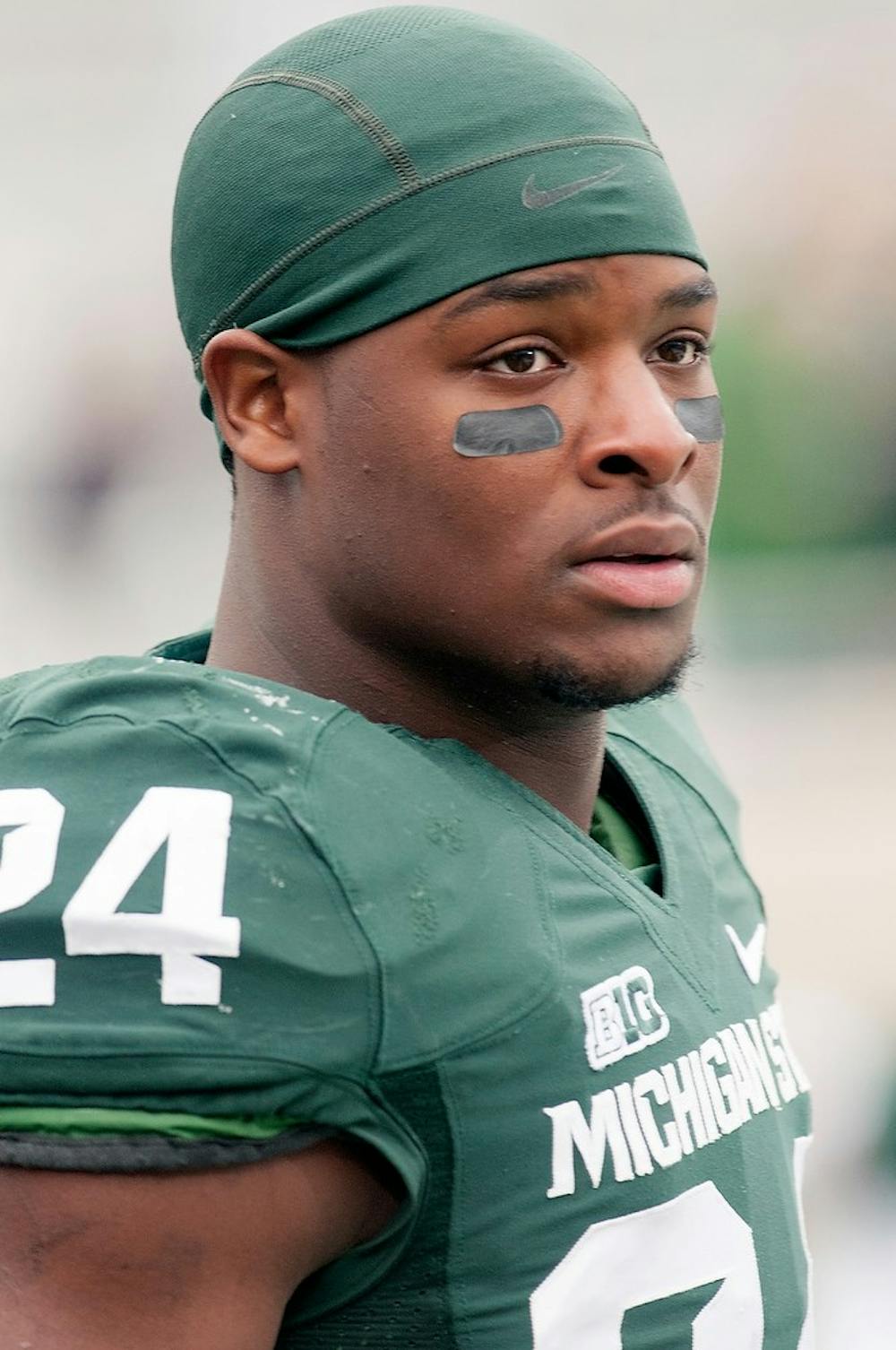 Junior running back Le'Veon Bell looks onto the field before the game against the Nebraska Cornhuskers on Nov. 3, 2012, at Spartan Stadium. Bell scored two of the three touchdowns made by MSU but the Spartans still fell to the Cornhuskers 28-24. Natalie Kolb/The State News