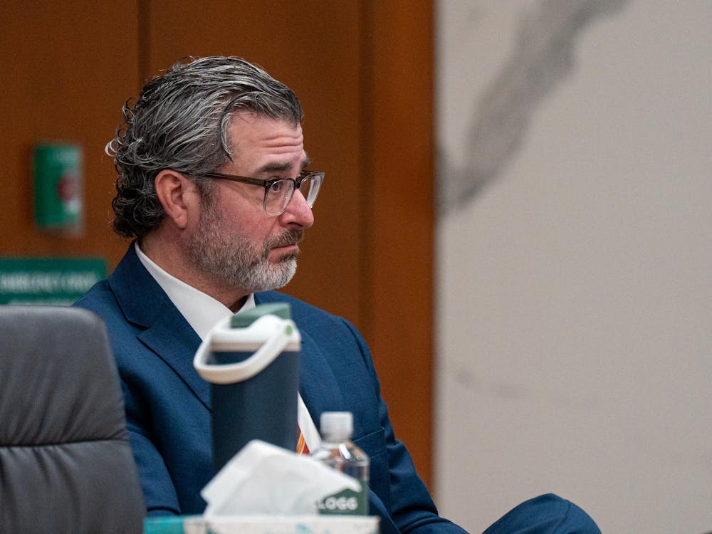 <p>Michigan State Board Vice President for Legal Affairs and General Counsel Brian Quinn listens during the Board of Trustees meeting at Hannah Administration Building in East Lansing, Michigan on April 10, 2026.</p>