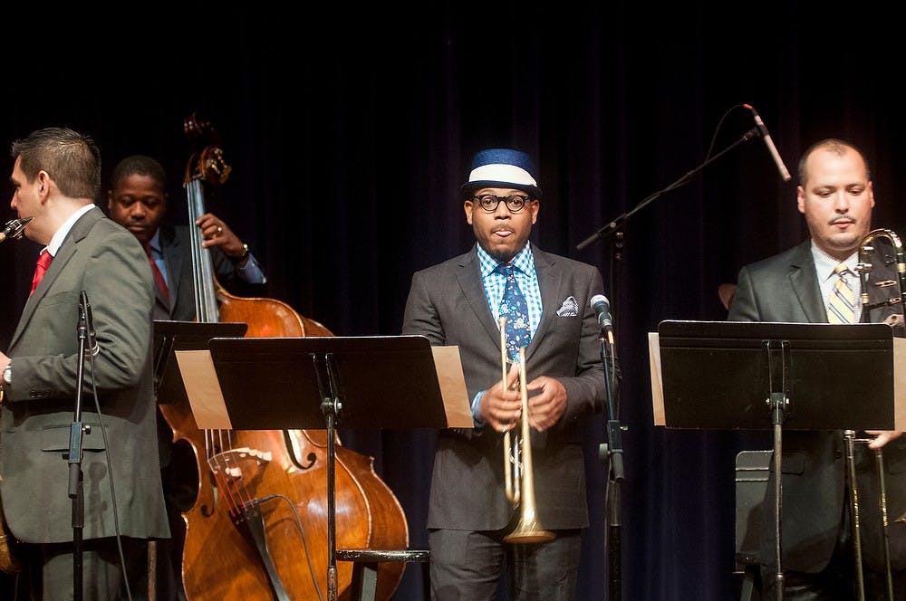 	<p>From left, assistant professor of jazz studies, saxophone, and improvisation Diego Rivera, assistant professor of jazz trumpet Etienne Charles, and assistant professor of jazz trombone Michael Dease prepare to begin the <span class="caps">MSU</span> Professors of Jazz concert Aug. 28, 2013 at the Pasant Theatre. The professors dedicated the performance to the 50th anniversary of the March on Washington. Katie Stiefel/The State News</p>