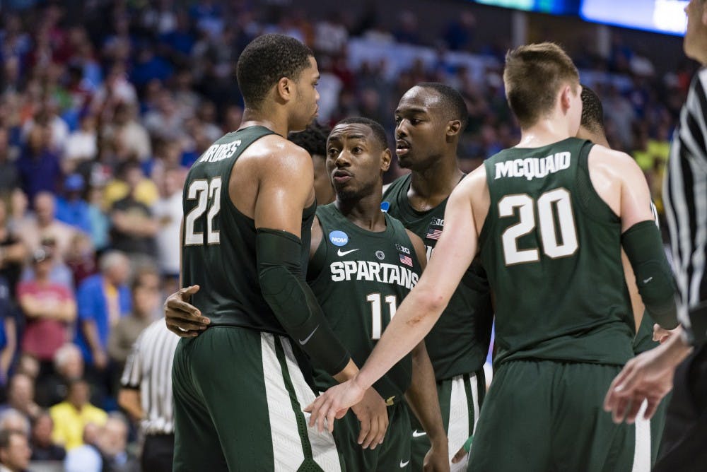 The Spartans huddle during the first half of the game against University of Kansas in the second round of the Men's NCAA Tournament on March 19, 2017 at  at the BOK Center in Tulsa, Okla.The Spartans were defeated by the Jayhawks, 90-70.