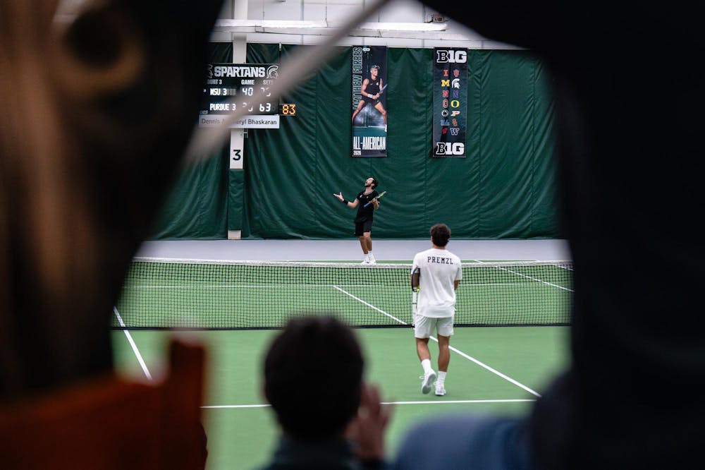 <p>Ozan Baris, a senior on the Michigan State men’s tennis team, celebrates moments after defeating Purdue sophomore Maj Premzl in the clinching match to secure the Big Ten Conference title for Michigan State Men's Tennis at the MSU Tennis Center in Lansing, Mich., Sunday, April 19, 2026.</p>