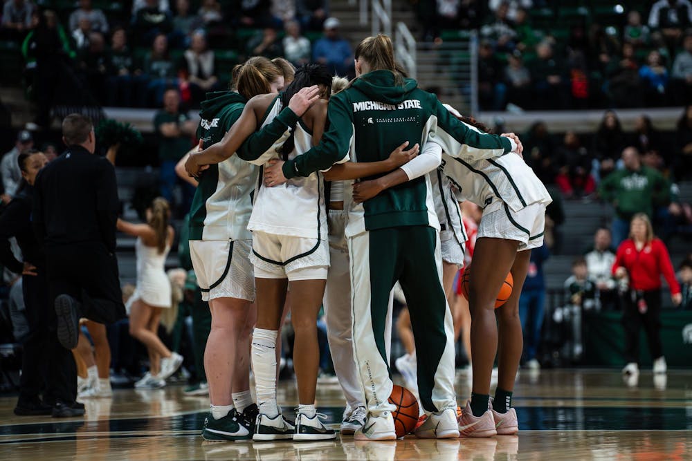 <p>Michigan State University's women's basketball team in a huddle before the game against Ohio State University at the Breslin Center in East Lansing, Michigan on Sunday, March 1, 2026.</p>