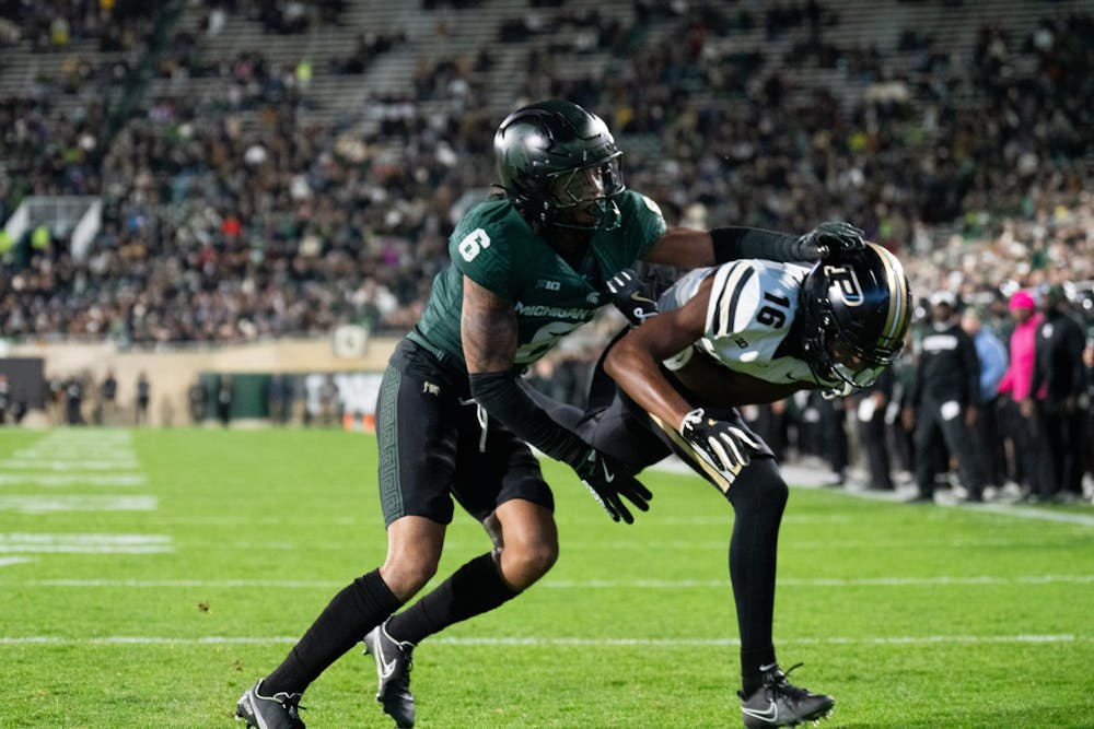 <p>Michigan State junior defensive back Ade Willie (6) tackles Purdue freshman wide receiver Shamar Rigby (16) at Spartan Stadium on Nov. 22, 2024.</p>