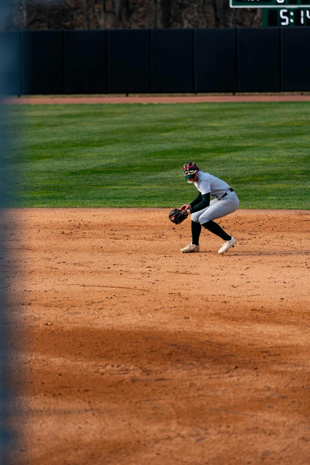 MSU softball player aiming her throw during the MSU V Nebraska Softball game at Secchia Stadium in East Lansing, on March 20 2026.
