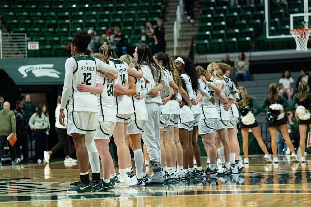 The MSU Women's Basketball team stands together after defeating Eastern Michigan 92-60 at Michigan State University's Breslin Center on Sunday, Nov. 9, 2025