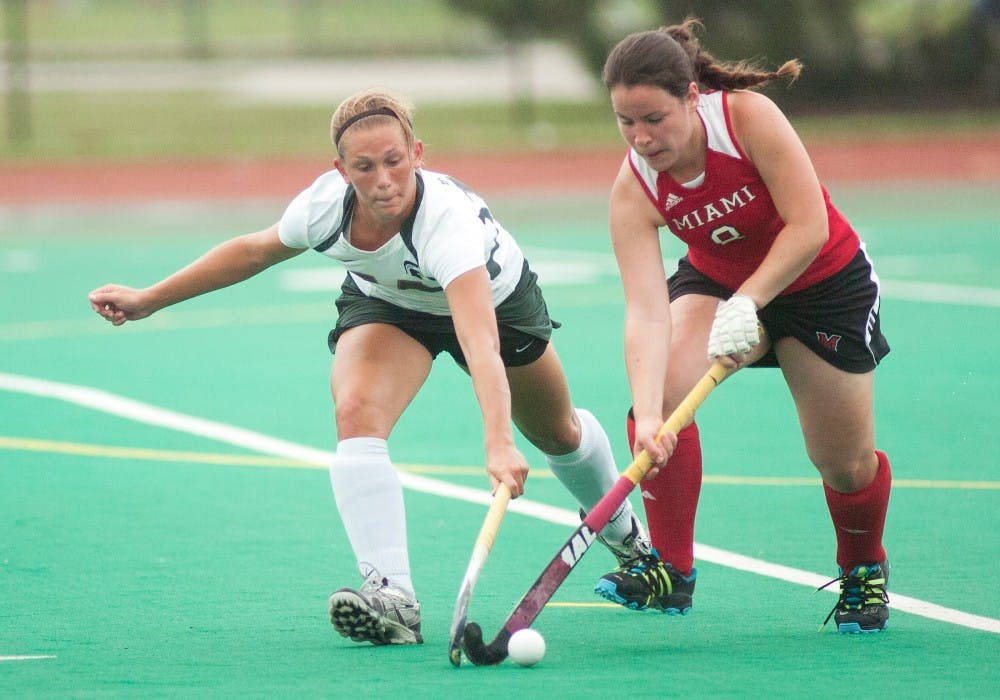 Allie Ahern, sophomore forward, sends the ball up-field during Sunday's game against Miami on Sept. 2, 2012, at Ralph Young Field.  Sunday's victory was the second home win for the Spartans at Ralph Young Field. James Ristau/The State News