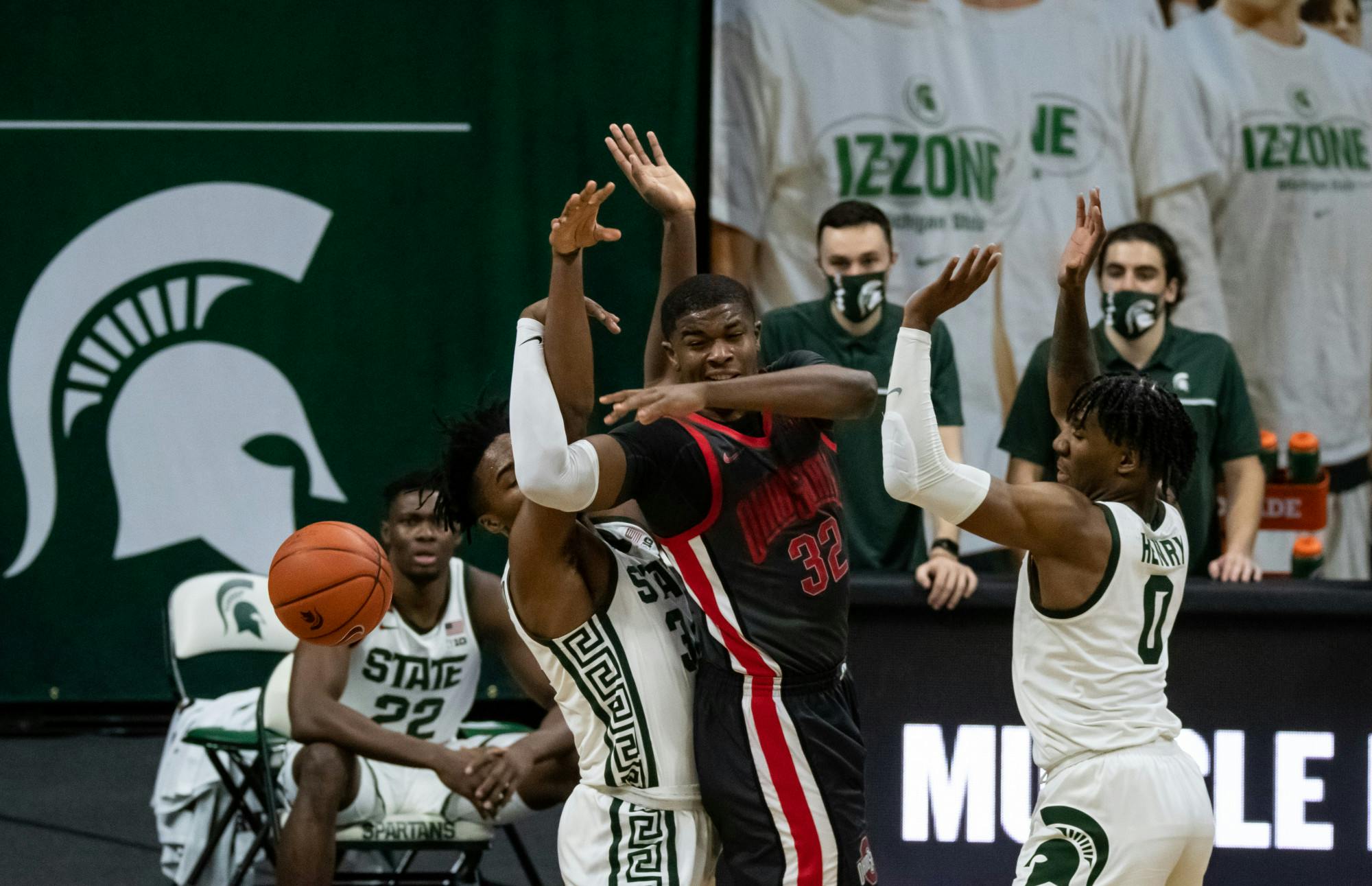 <p>Players wrestle for the ball during the MSU men&#x27;s basketball game against OSU at the Breslin Center on Feb. 25, 2021.</p>