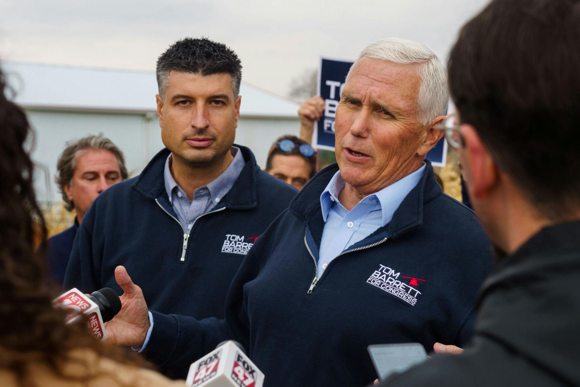 <p>Michigan State Senator Tom Barrett and Former Vice President Mike Pence address the press at a rally supporting Barrett’s US Representative campaign at Country Mill farm on Nov. 4, 2022.</p>