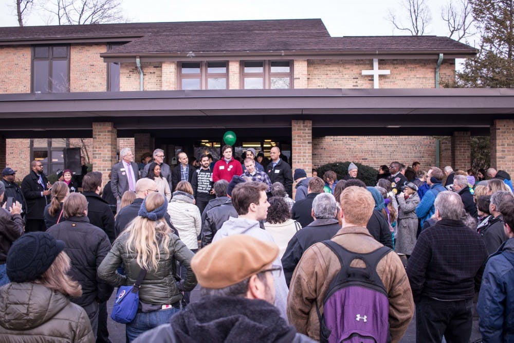 A crowd gathers around as several speakers address the people attending the event outside the All Saints Episcopal Church on March 5, 2018 at the Celebration of Diversity Festival. The festival was organized in response to Richard Spencer's alt-right event at the MSU Pavilion.