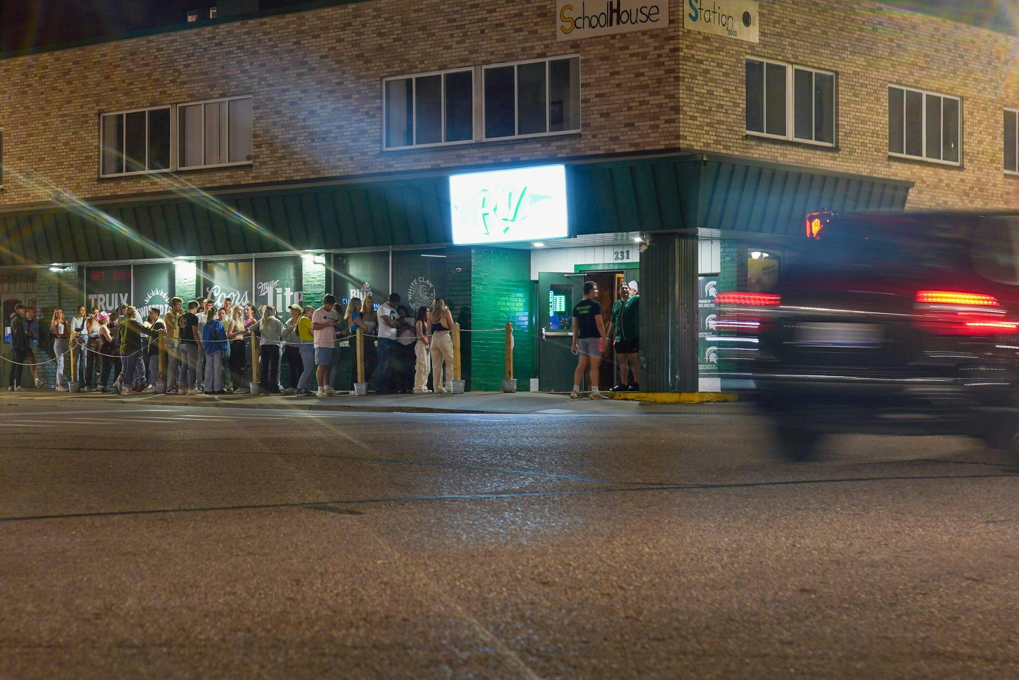 People line up outside of The Riv in East Lansing on Sept. 29, 2023. 