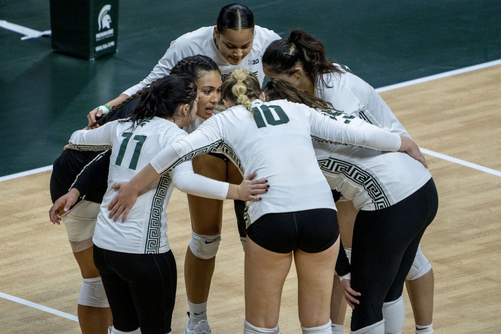 <p>MSU Players huddle during a game between MSU and Nebraska at the Breslin Center on Oct. 6, 2022. The Spartans fell to the Cornhuskers, 3-0.</p>