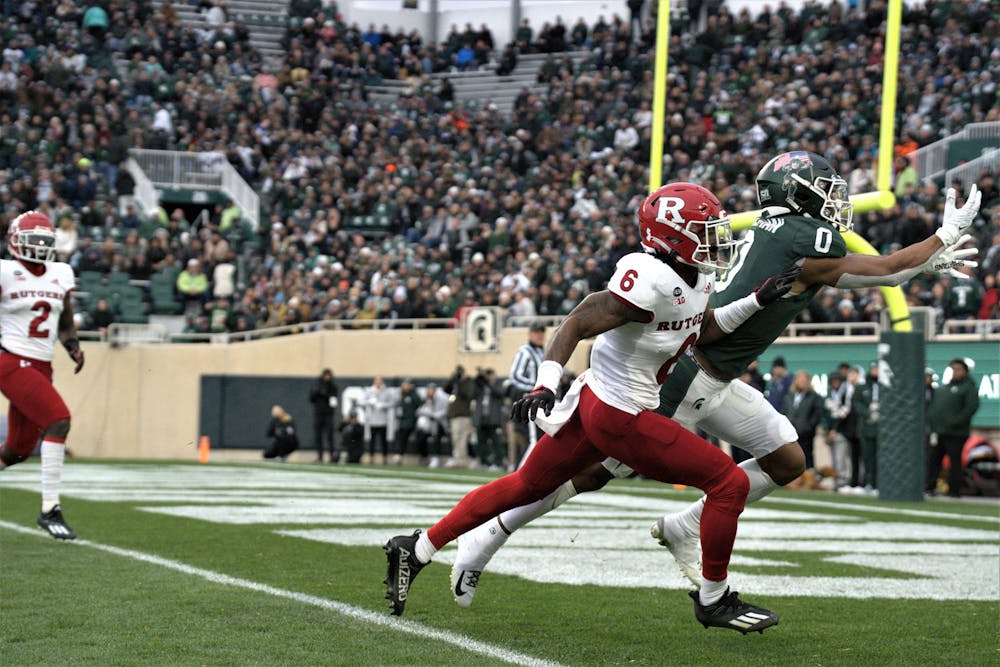 <p>Wide receiver #0 Keon Coleman attempts to ﻿catch a pass to the end line during the matchup against Rutgers on Nov. 12, 2022.</p>