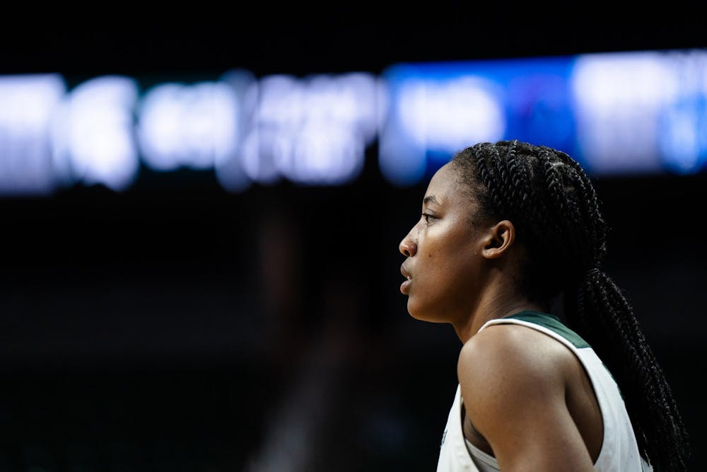 Michigan State graduate student guard Jaddan Simmons (1) watches the court at the Breslin Center on Dec. 8, 2024. The Spartans won 89-61 against the Blue Demons of DePaul University, starting the season 9-0 for the first time in program history. 