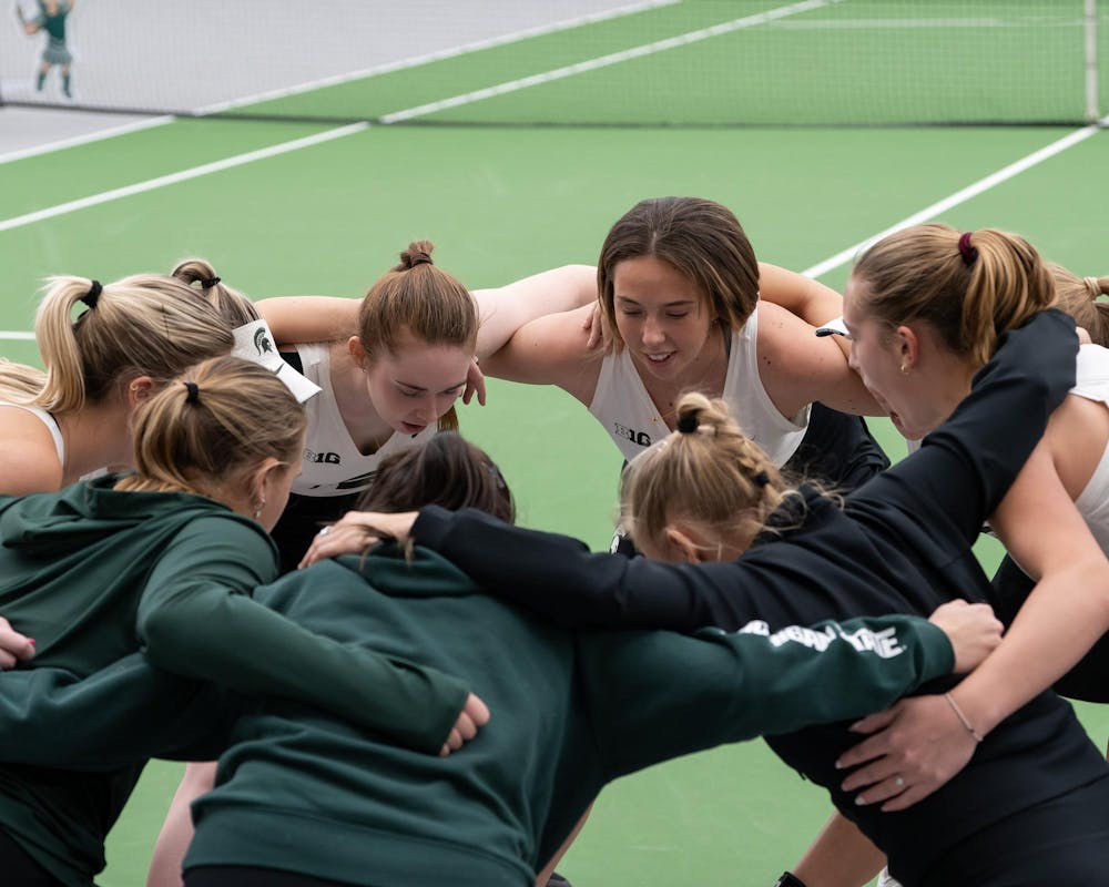 <p>Michigan State women's tennis team huddles up before a match against Xavier at the MSU Indoor Tennis Center on Jan. 24, 2025.</p>