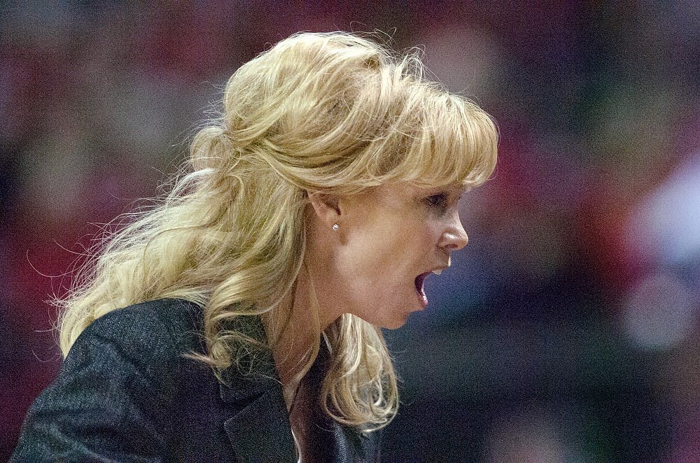 <p>head women's basketball coach Suzy Merchant yells at her bench during the second round of the NCAA Tournament on Monday, March 25, 2013, at Comcast Center in College Park, Maryland. The Spartans lost to Maryland, 74-49. Julia Nagy/The State News</p>