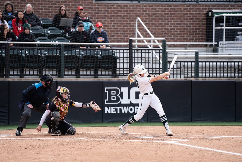 <p>MSU player Brooke Snyder swings off a Maryland pitch during the match on April 29th, 2022. </p>