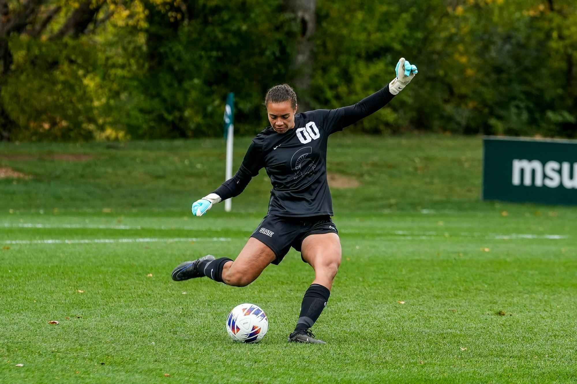 <p>Michigan State University graduate student goalkeeper Kaitlyn Parks (00) kicking the ball for the game against University of Iowa at DeMartin Soccer Complex on Oct. 29, 2023.   </p>