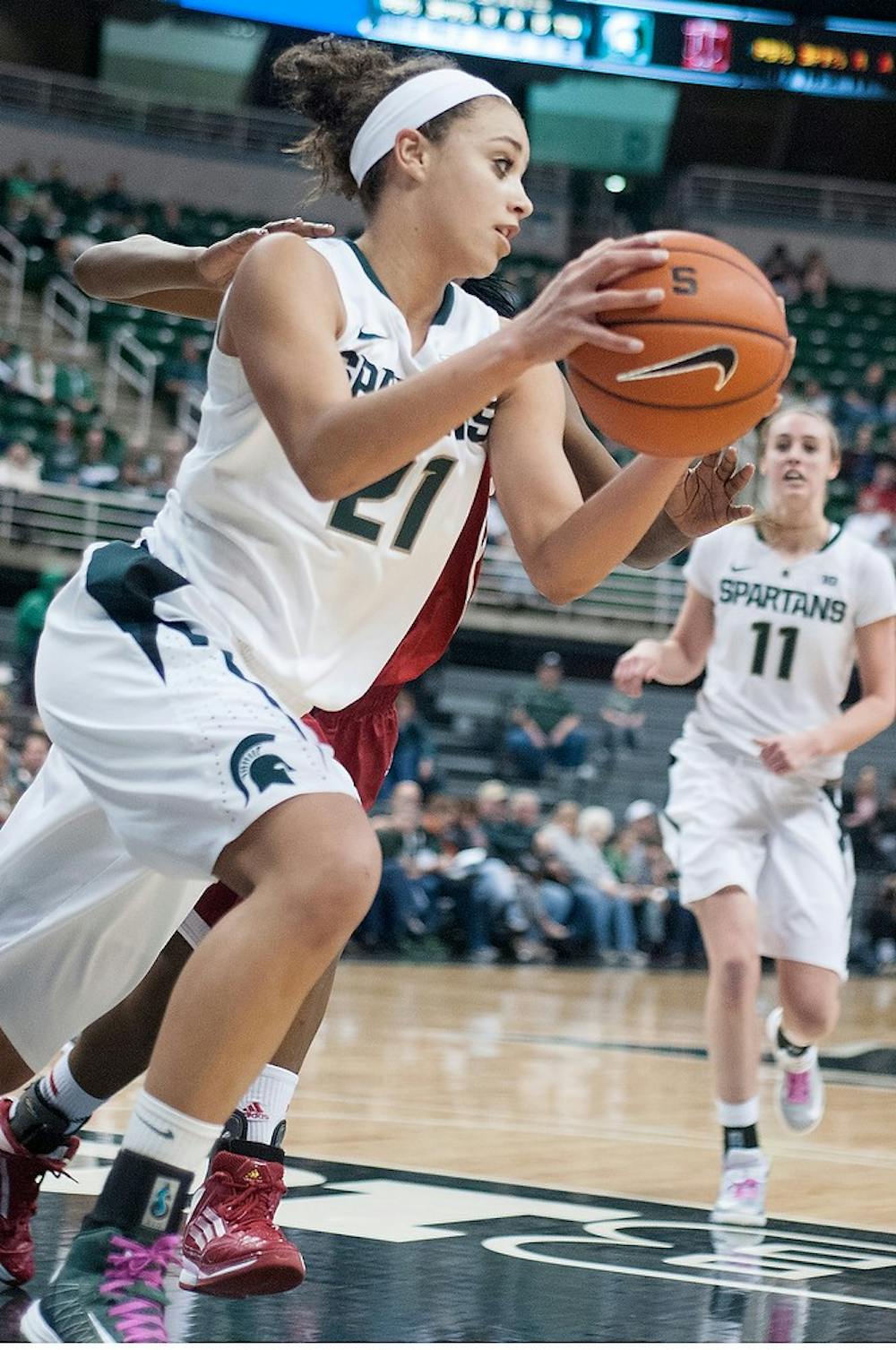 	<p>Junior guard Klarissa Bell catches a rebound against Indiana on Feb. 13, 2013, at Breslin Center. The Spartans defeated the Hoosiers, 72-42. Julia Nagy/The State News</p>
